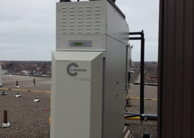 One 65KW gas turbine CHP installed on the rooftop of a multi-residential apartment building