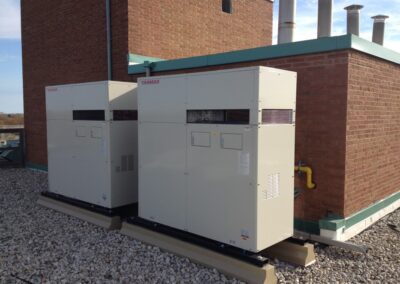 Two 35KW CHPs installed on the rooftop of a multi-residential apartment building